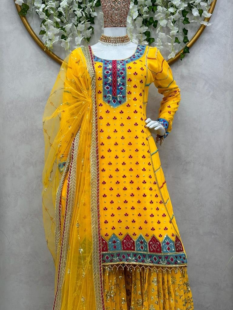 Yellow georgette heavy embroidery work sharara suit for haldi ceremony