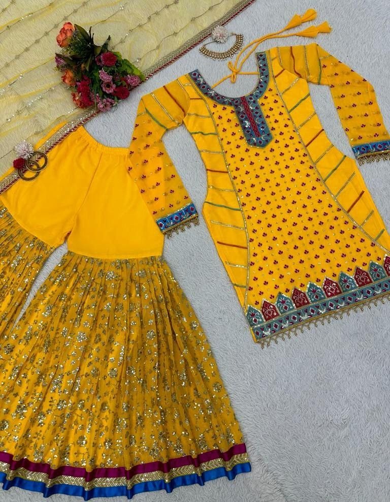 Yellow georgette heavy embroidery work sharara suit for haldi ceremony