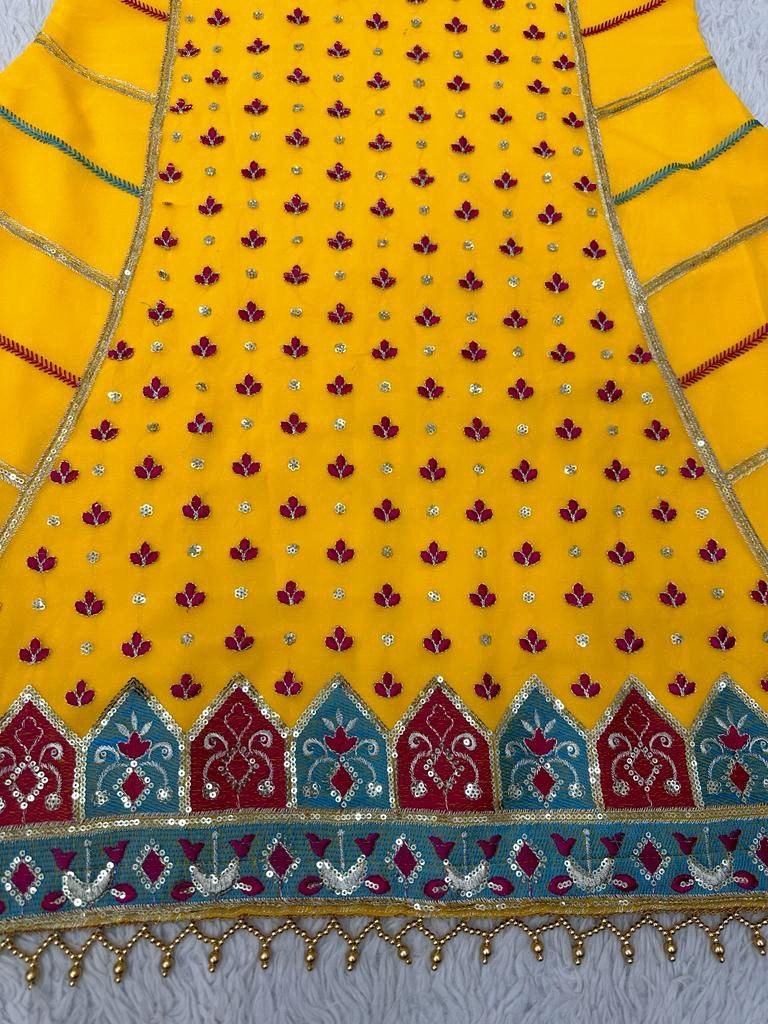 Yellow georgette heavy embroidery work sharara suit for haldi ceremony