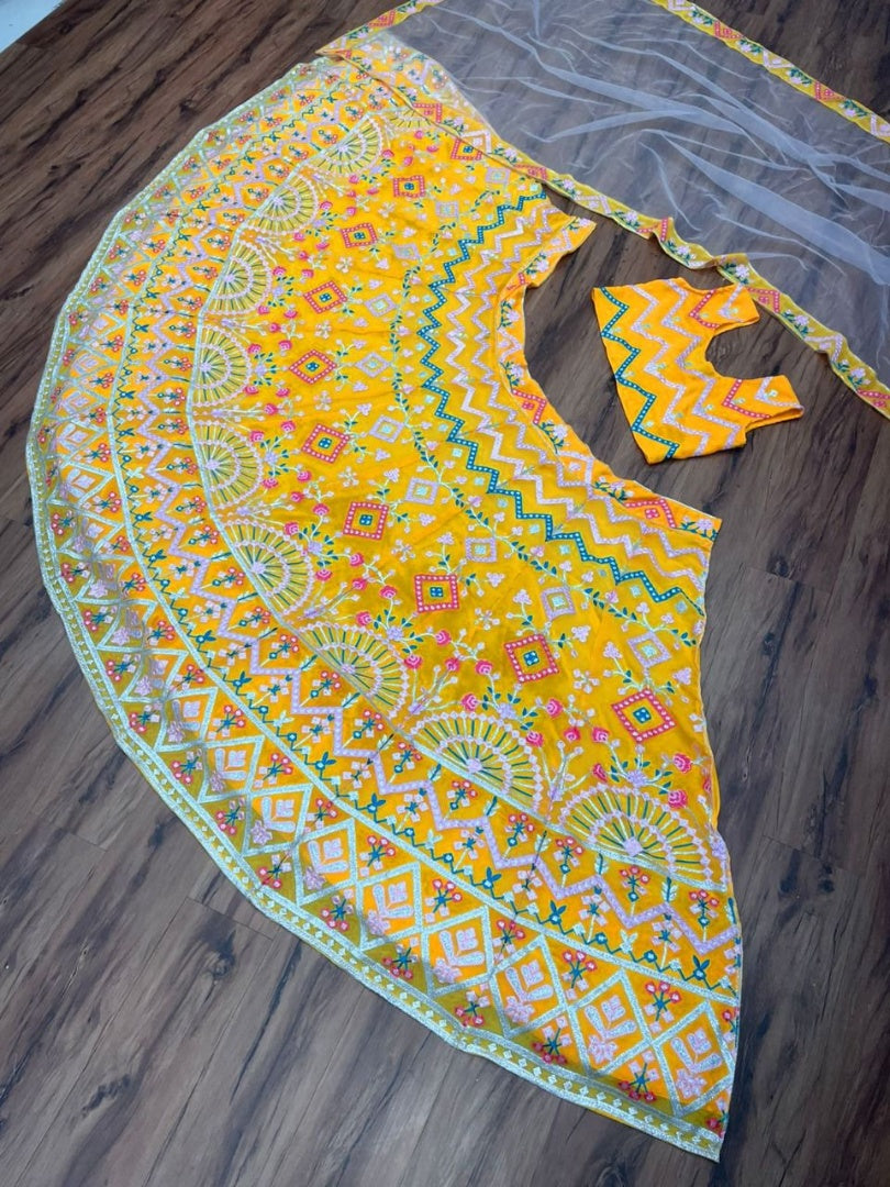 Yellow georgette heavy multi thread embroidered ceremonial lehenga choli
