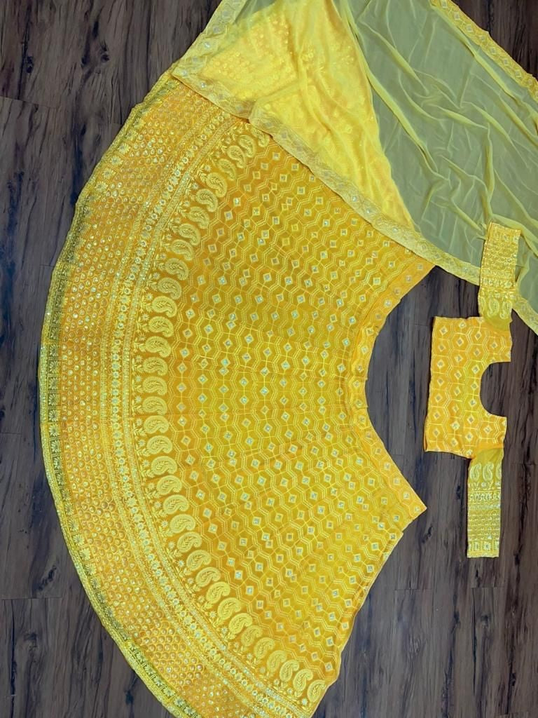 Yellow georgette heavy thread and sequence work lehenga choli for haldi ceremony