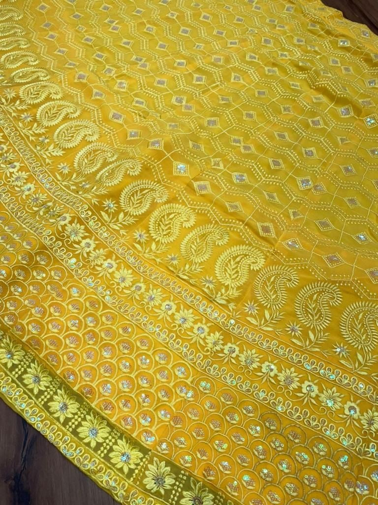 Yellow georgette heavy thread and sequence work lehenga choli for haldi ceremony