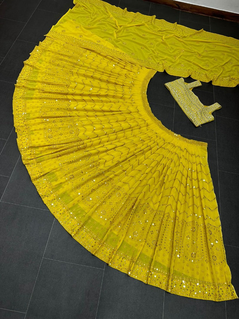 Yellow georgette heavy thread sequence work lehenga for haldi ceremony