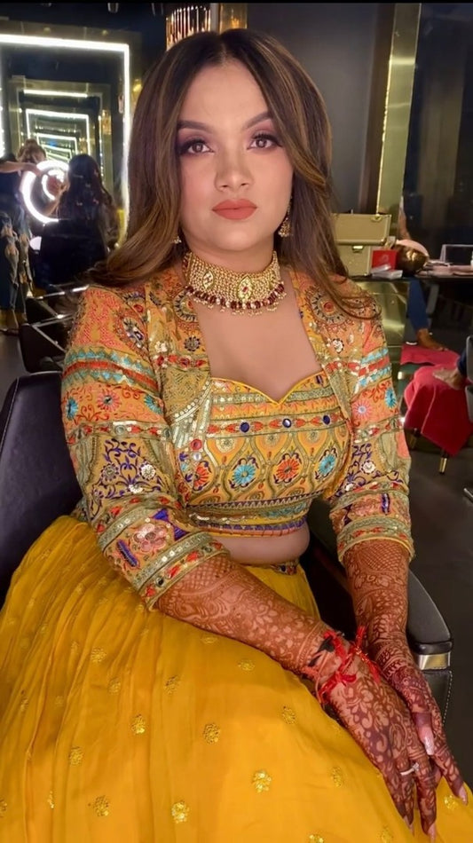 Yellow georgette multi color embroidered indowestern lehenga with jacket