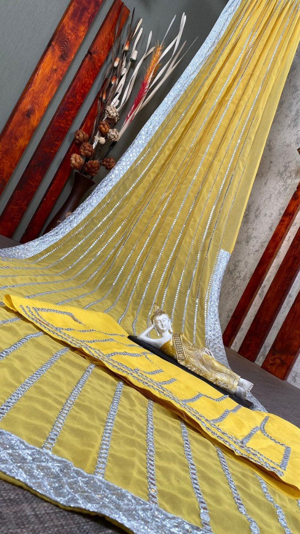 Yellow georgette paper embroidered festival wear saree