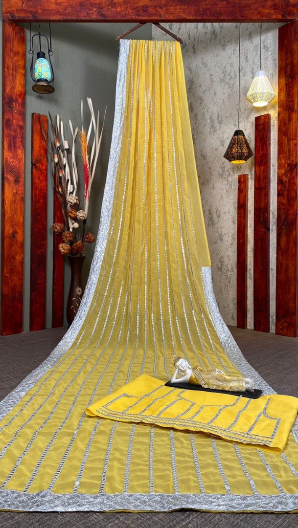 Yellow georgette paper embroidered festival wear saree