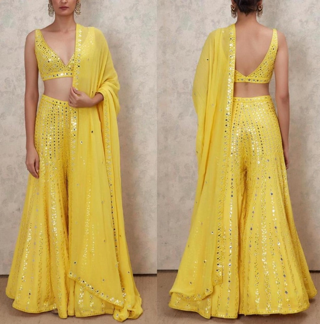 Yellow georgette paper mirror work sharara suit