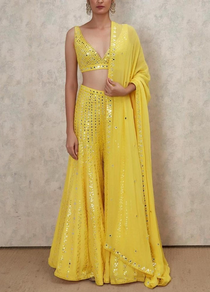 Yellow georgette paper mirror work sharara suit