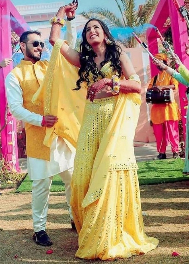 Yellow georgette paper mirror work sharara suit
