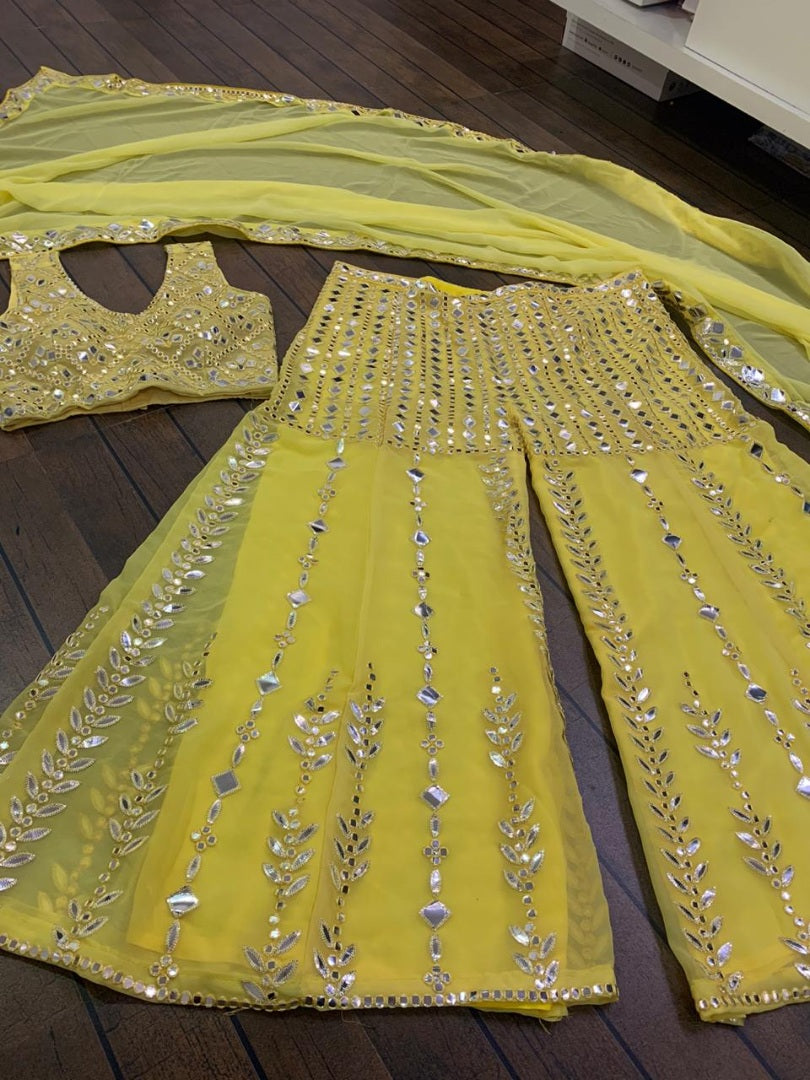 Yellow georgette paper mirror work sharara suit