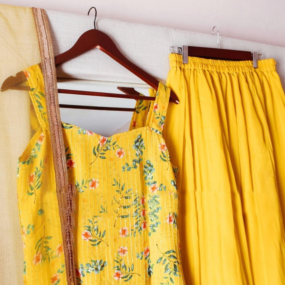 Yellow georgette print and sequence work plazzo suit