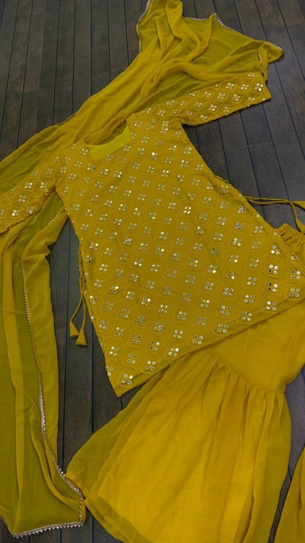 Yellow georgette thread and paper mirror work sharara suit