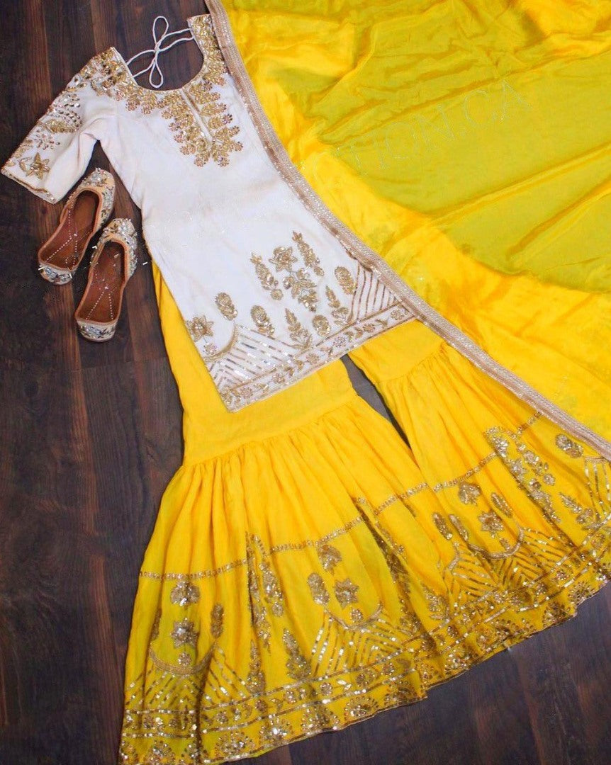 Yellow georgette zari embroidered work plazzo suit