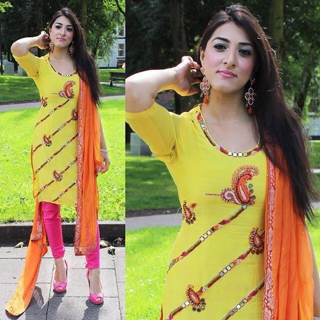 Yellow heavy crepe silk embroidery and mirror work salwar suit