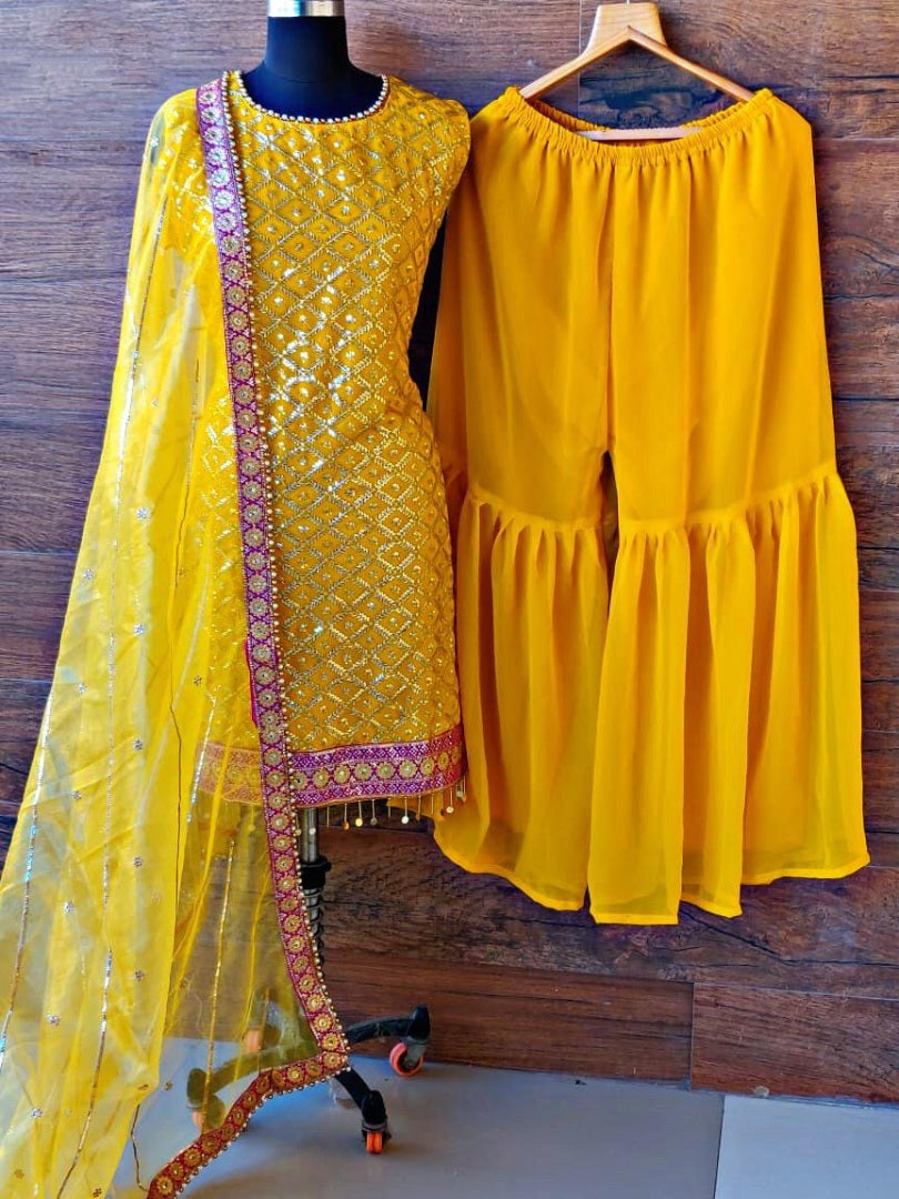 Yellow heavy georgette embroidered designer sharara salwar suit