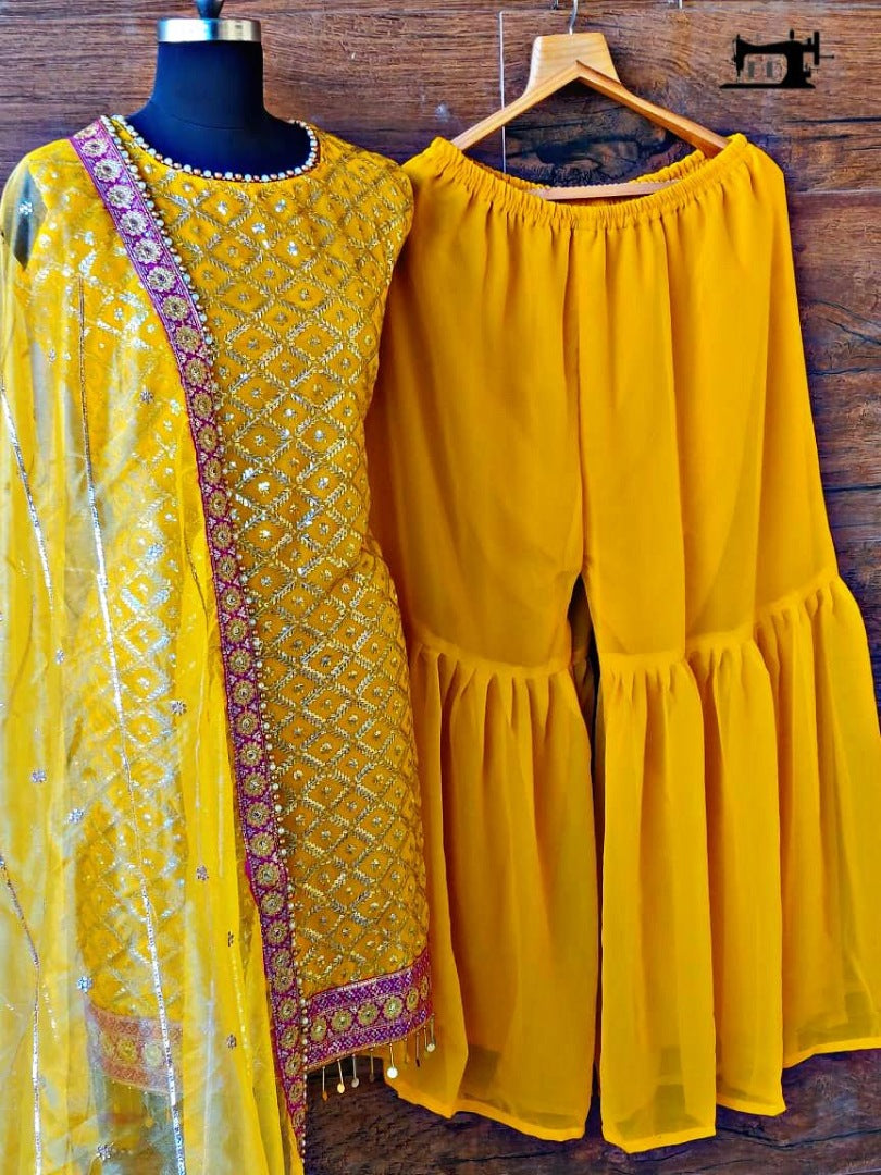 Yellow heavy georgette embroidered designer sharara salwar suit