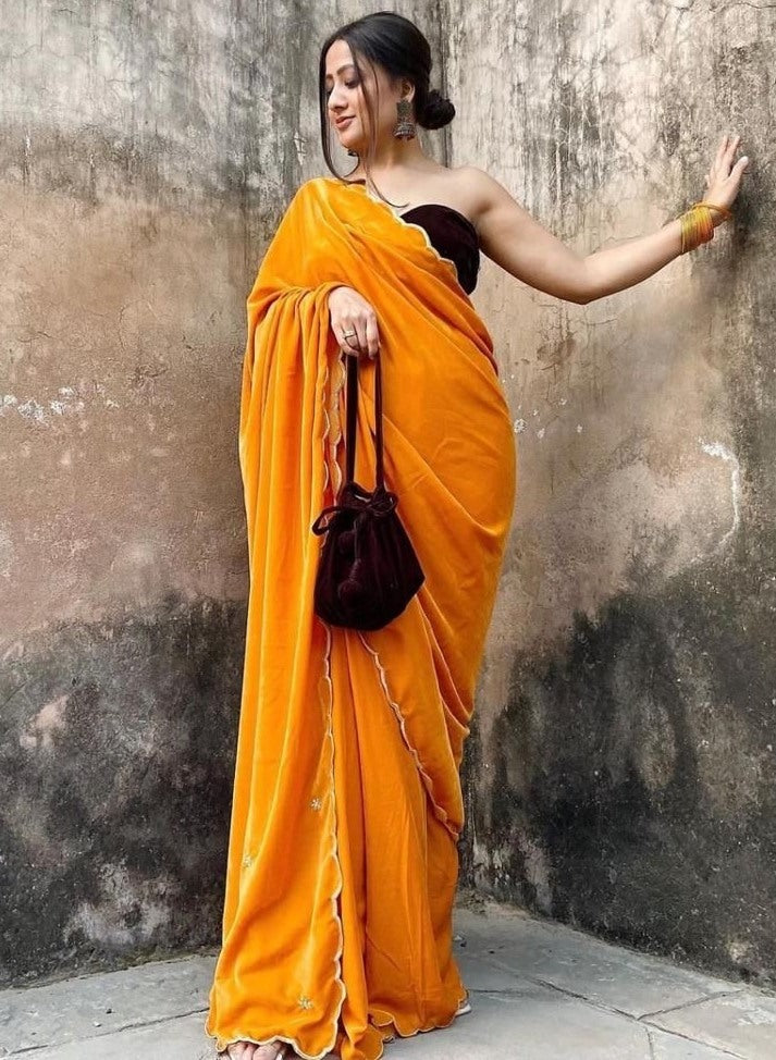 Yellow heavy velvet handwork saree