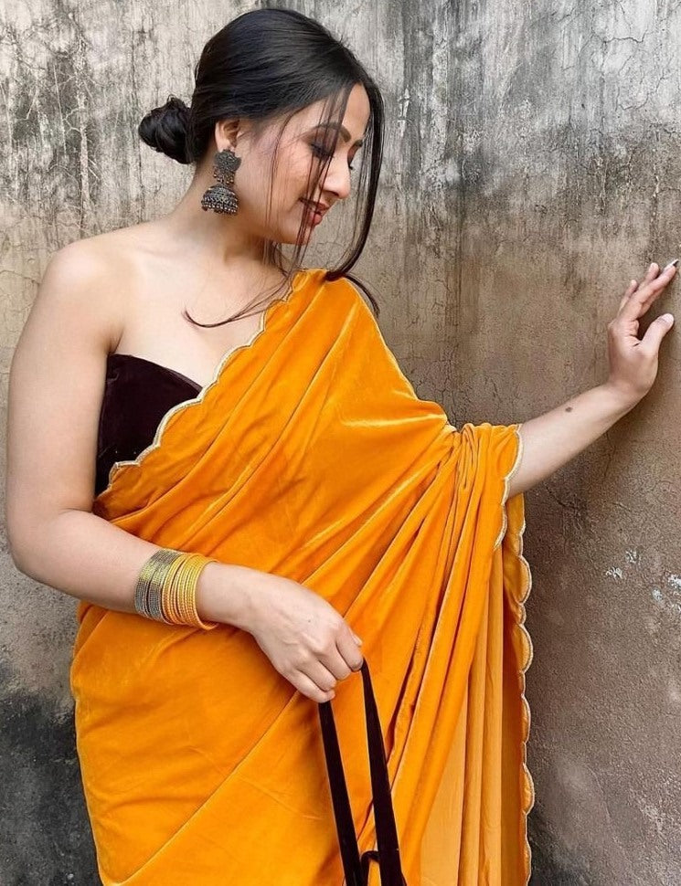 Yellow heavy velvet handwork saree