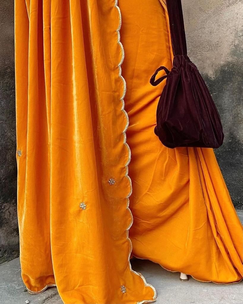 Yellow heavy velvet handwork saree