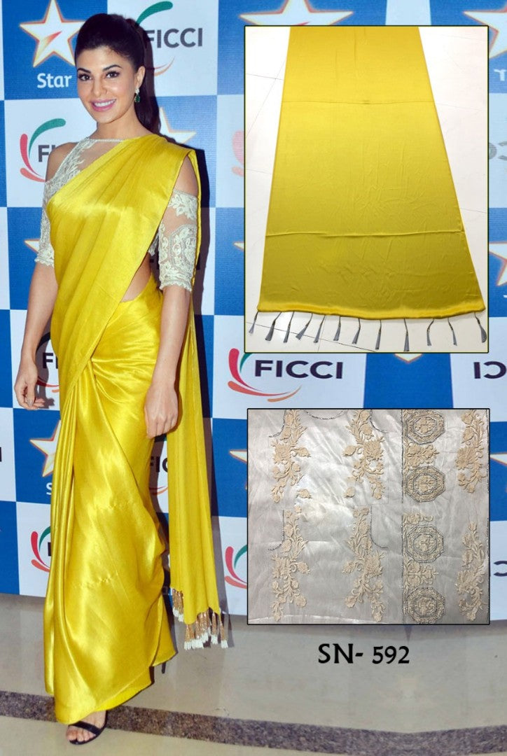 yellow japan crepe partywear saree with thread and handwork blouse