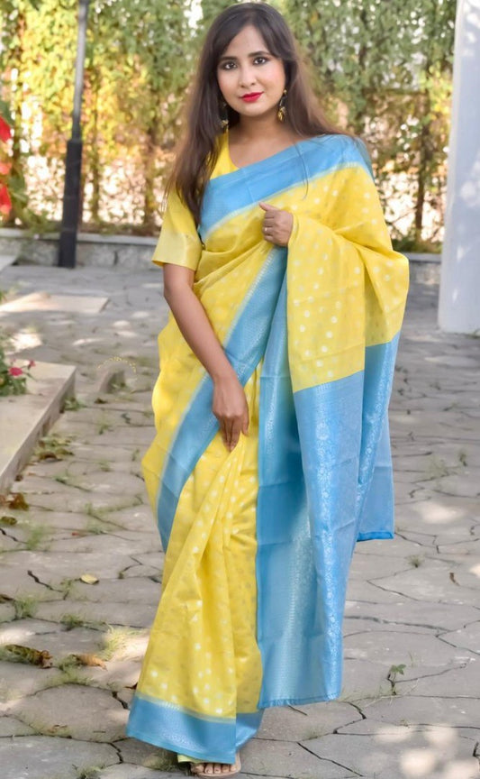 Yellow lichi silk jacquard weaving work saree