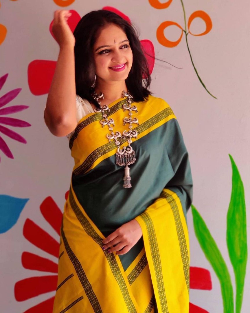 Yellow lichi silk jacquard weaving work saree