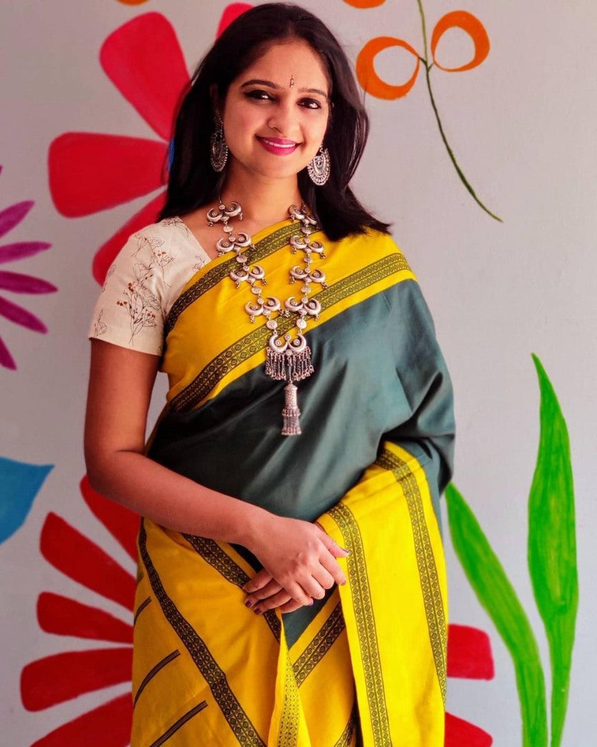 Yellow lichi silk jacquard weaving work saree