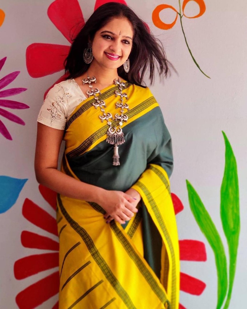 Yellow lichi silk jacquard weaving work saree
