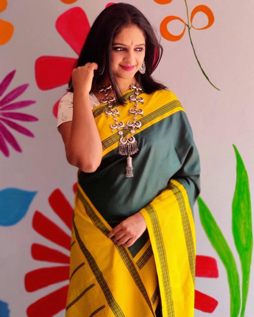 Yellow lichi silk jacquard weaving work saree