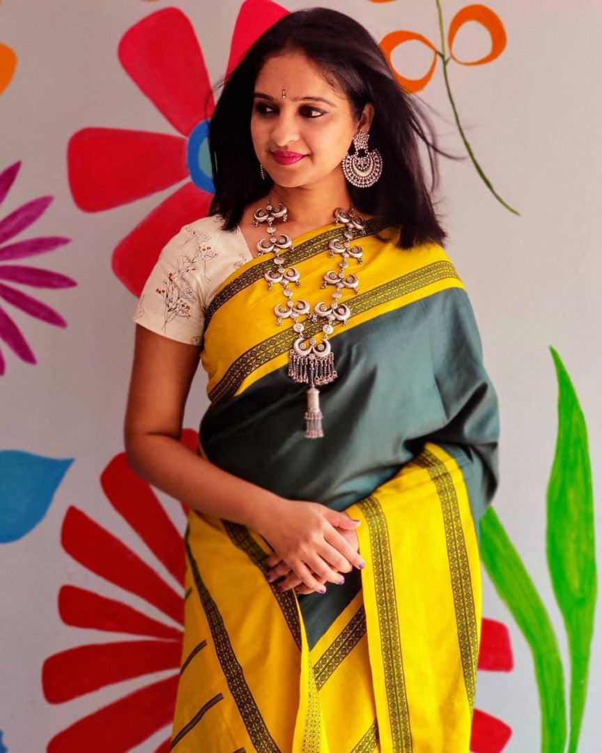 Yellow lichi silk jacquard weaving work saree