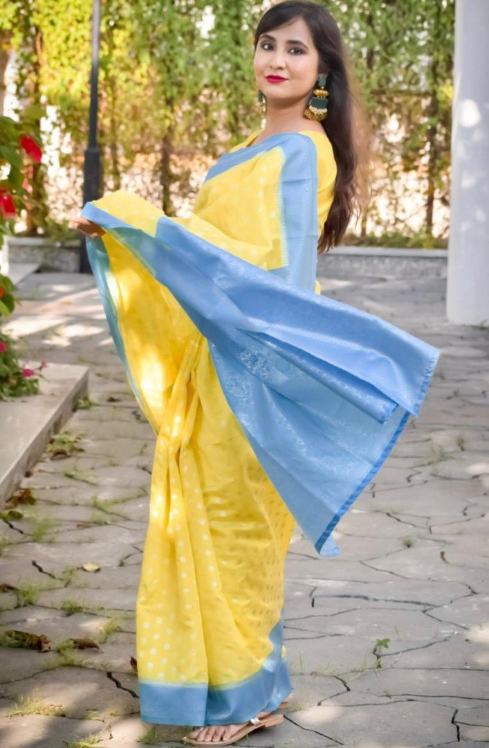 Yellow lichi silk jacquard weaving work saree