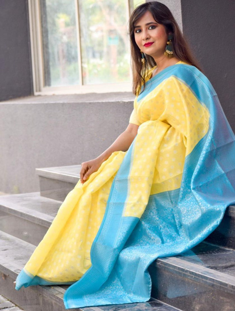Yellow lichi silk jacquard weaving work saree