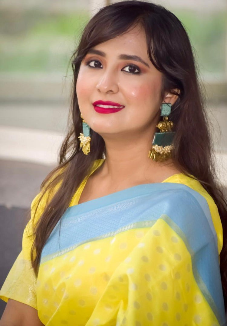 Yellow lichi silk jacquard weaving work saree