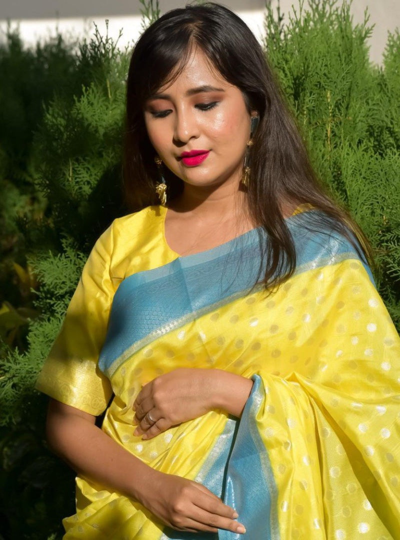 Yellow lichi silk jacquard weaving work saree