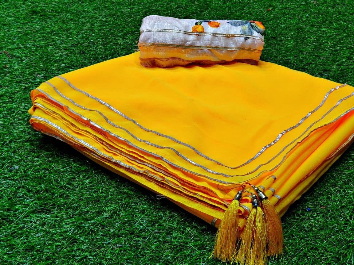 Yellow moss georgette plain saree with floral printed blouse