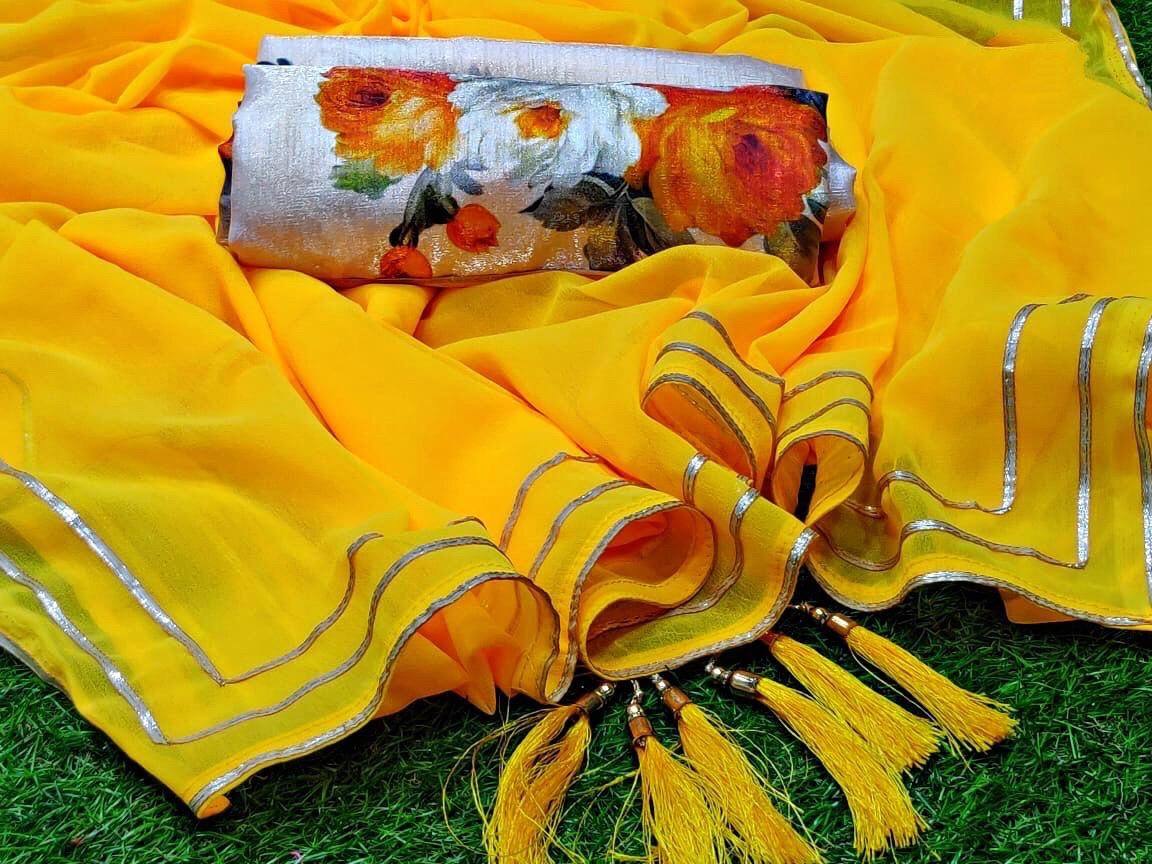 Yellow moss georgette plain saree with floral printed blouse