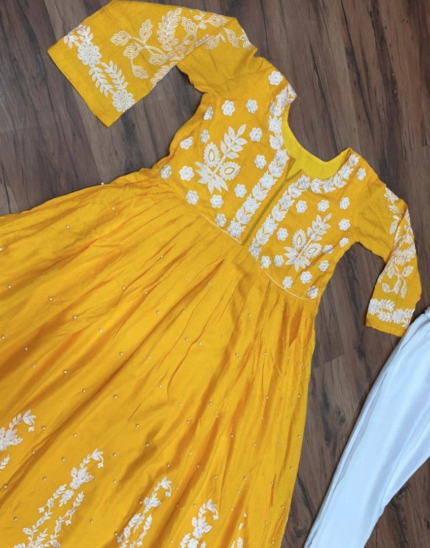 Yellow muslin cotton embroidered with moti work plazzo suit