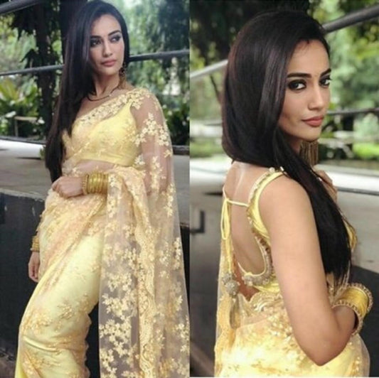 yellow net beautiful heavy embroidered surbhi jyoti saree