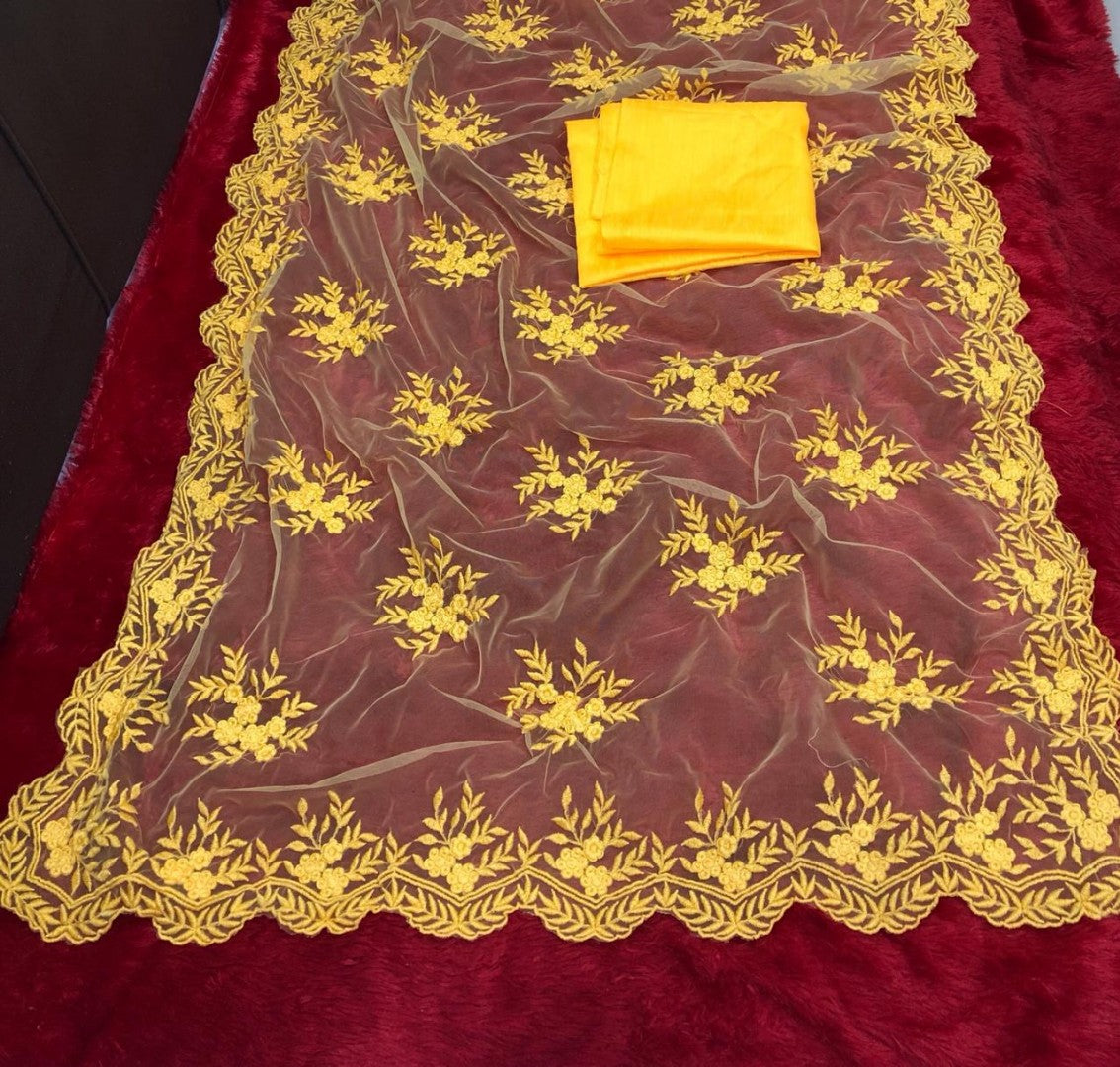 yellow net beautiful heavy embroidered surbhi jyoti saree