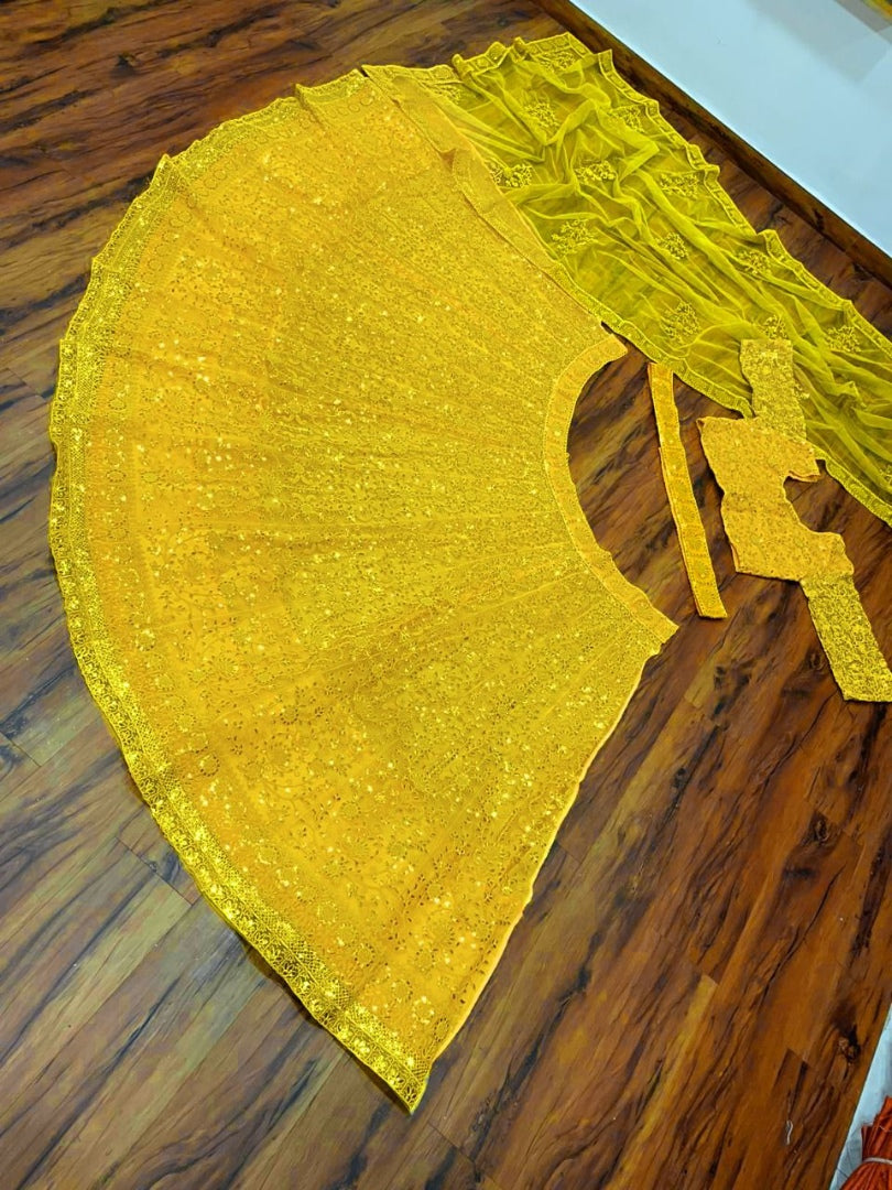 Yellow net coding heavy dori work wedding lehenga choli