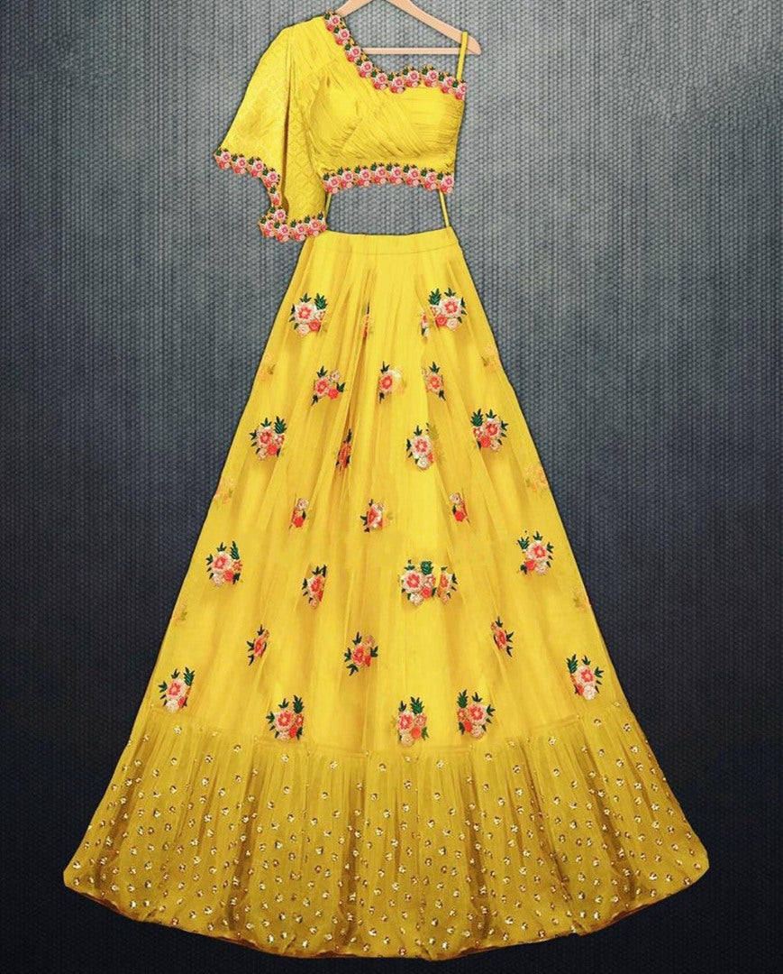 Yellow net embroidered lehenga choli