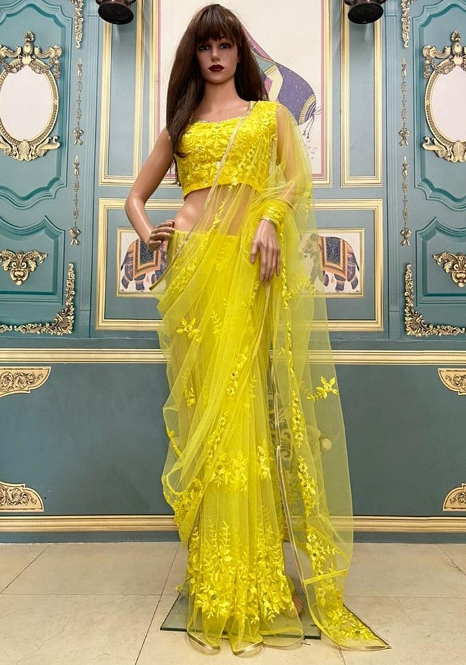 Yellow net embroidered saree