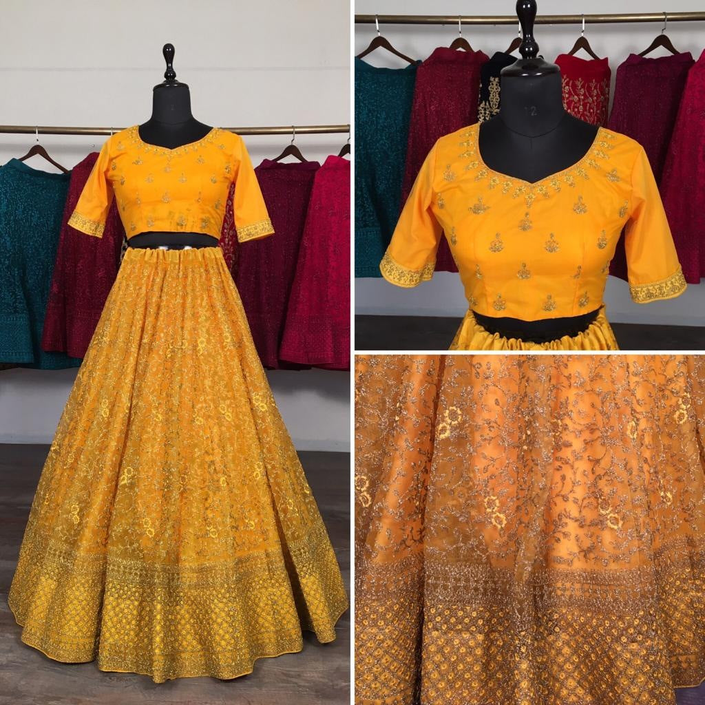 Yellow net glitter zari embroidery work lehenga choli