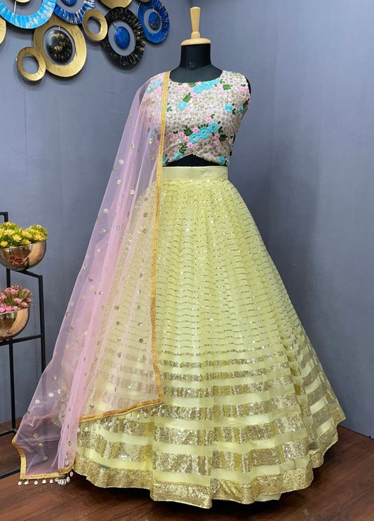 Yellow net heavy sequence work lehenga choli