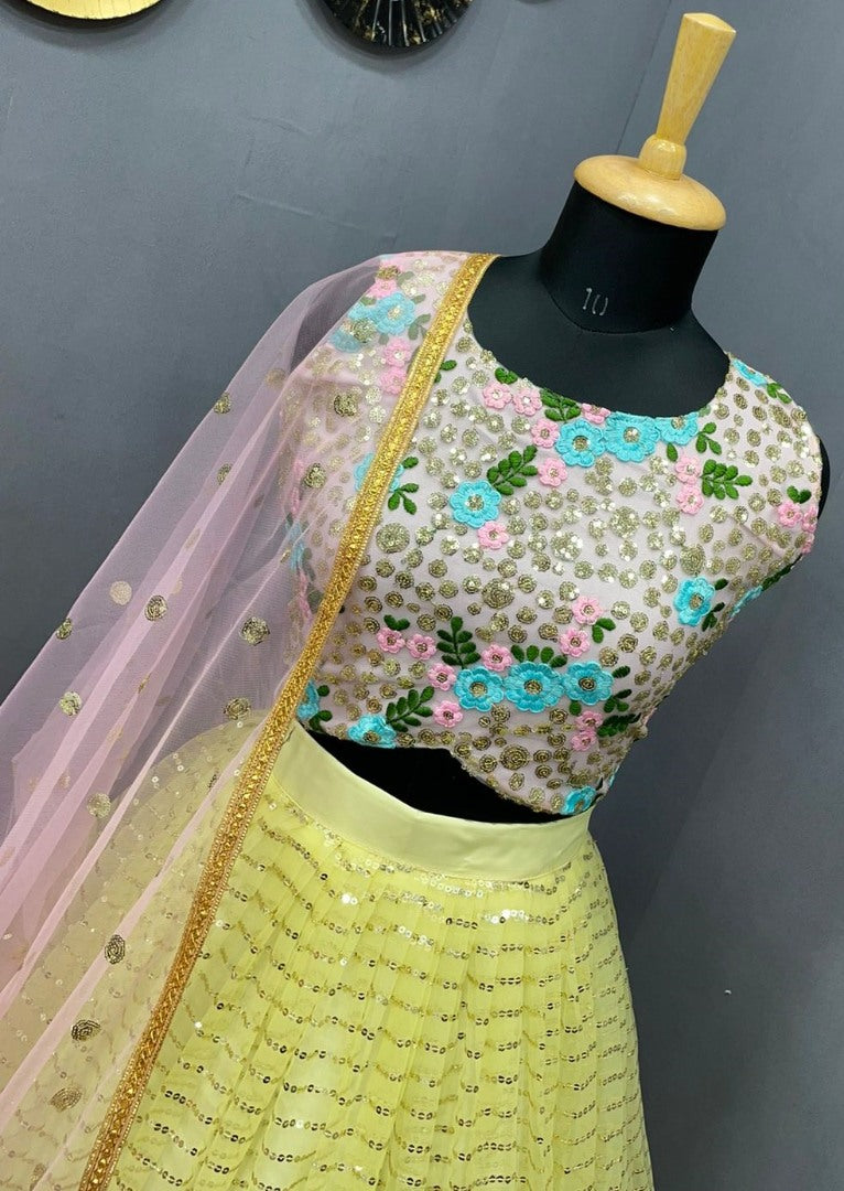 Yellow net heavy sequence work lehenga choli