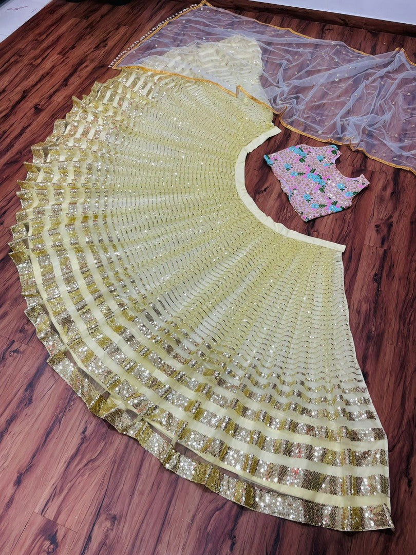 Yellow net heavy sequence work lehenga choli