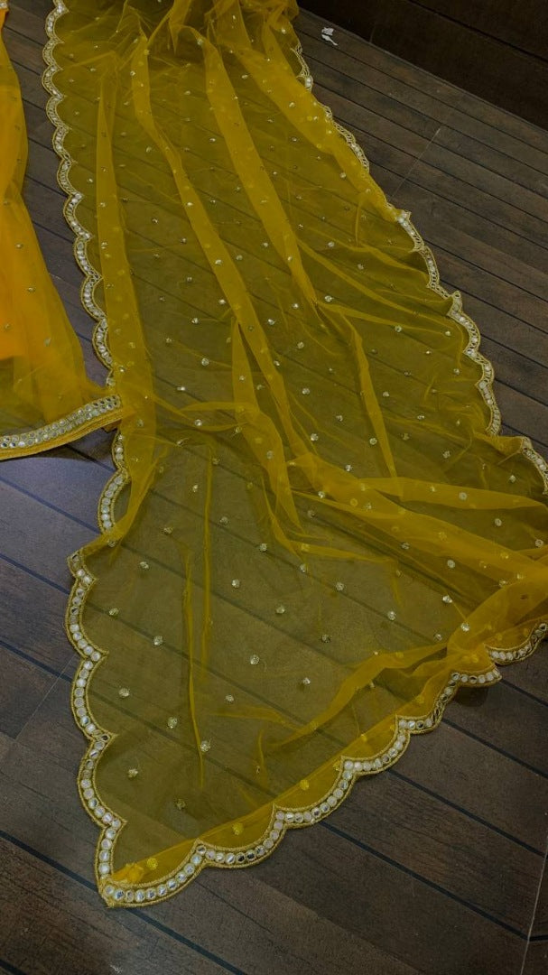 Yellow net sequence embroidery work ruffle lehenga choli for ceremony