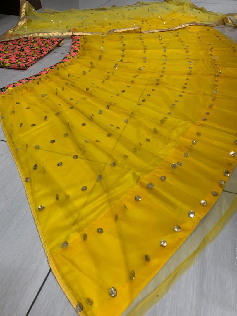 Yellow net sequence work lehenga choli