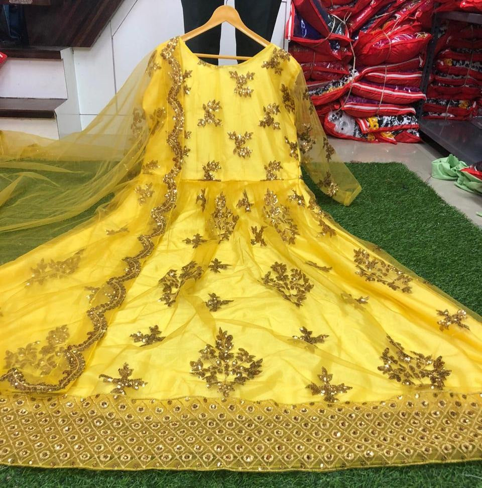 Yellow net sequence worked wedding gown with dupatta