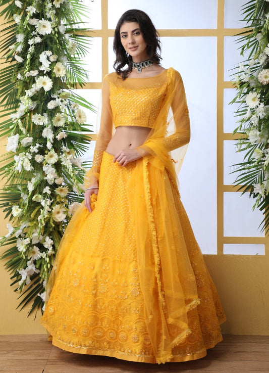 Yellow net thread and sequence embroidered wedding lehenga choli